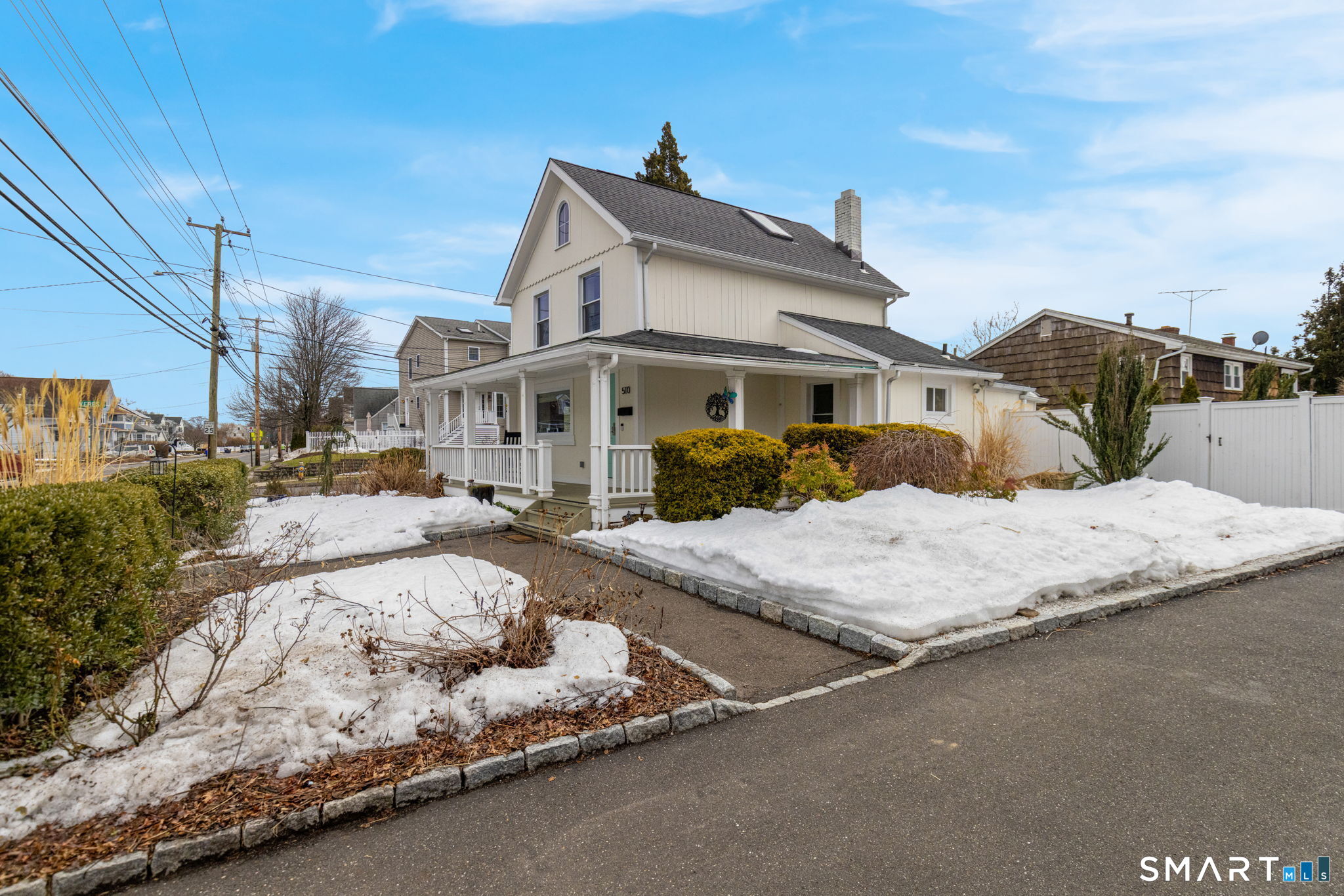 510 Reef Road Fairfield, CT 06824 - Photo 22 of 31 a front view of a house with a yard