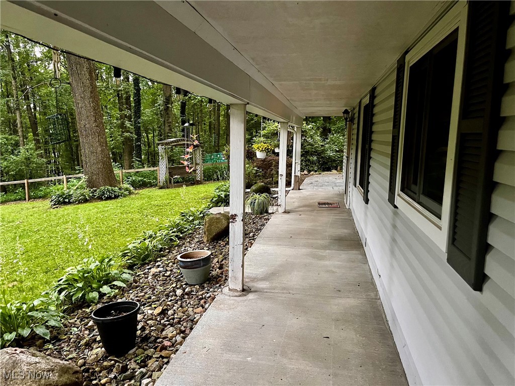 9435 Coit Road Mantua, OH 44255 - Photo 23 of 38 Covered Wrap Around Walkway/Porch