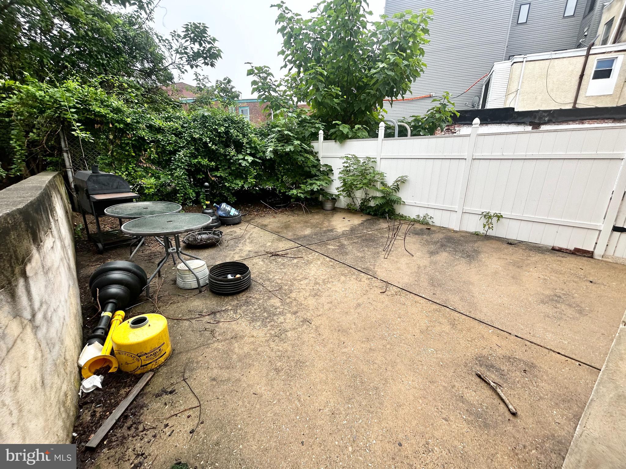3824 Lancaster Avenue Philadelphia, PA 19104 - Photo 12 of 20 a view of a backyard with table and chairs