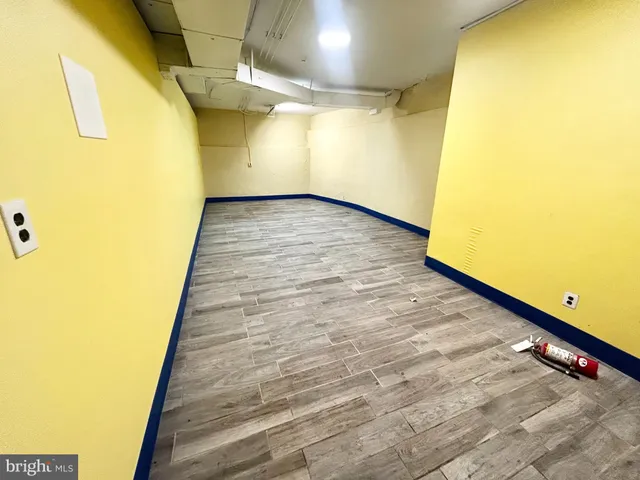 a view of a big room with wooden floor