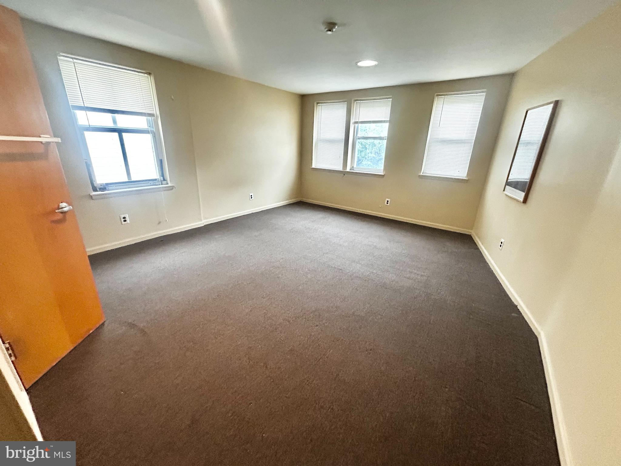 3824 Lancaster Avenue Philadelphia, PA 19104 - Photo 15 of 20 an empty room with windows
