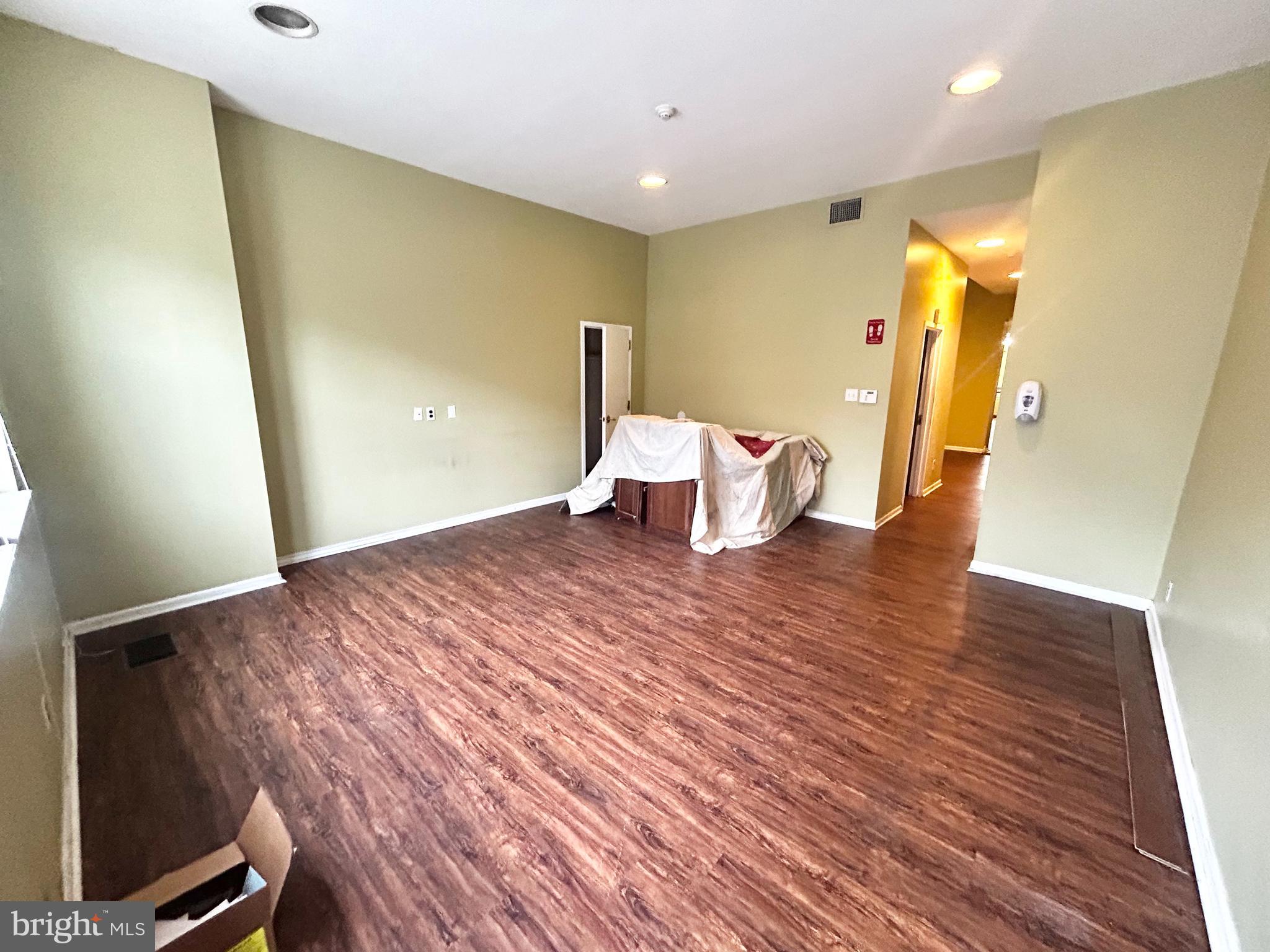 3824 Lancaster Avenue Philadelphia, PA 19104 - Photo 4 of 20 a view of a living room with a wooden floor