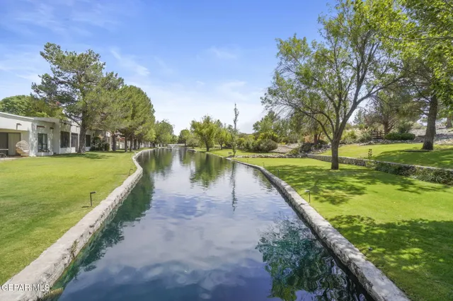 a view of a lake with a park