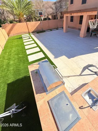 a view of a back yard of the house