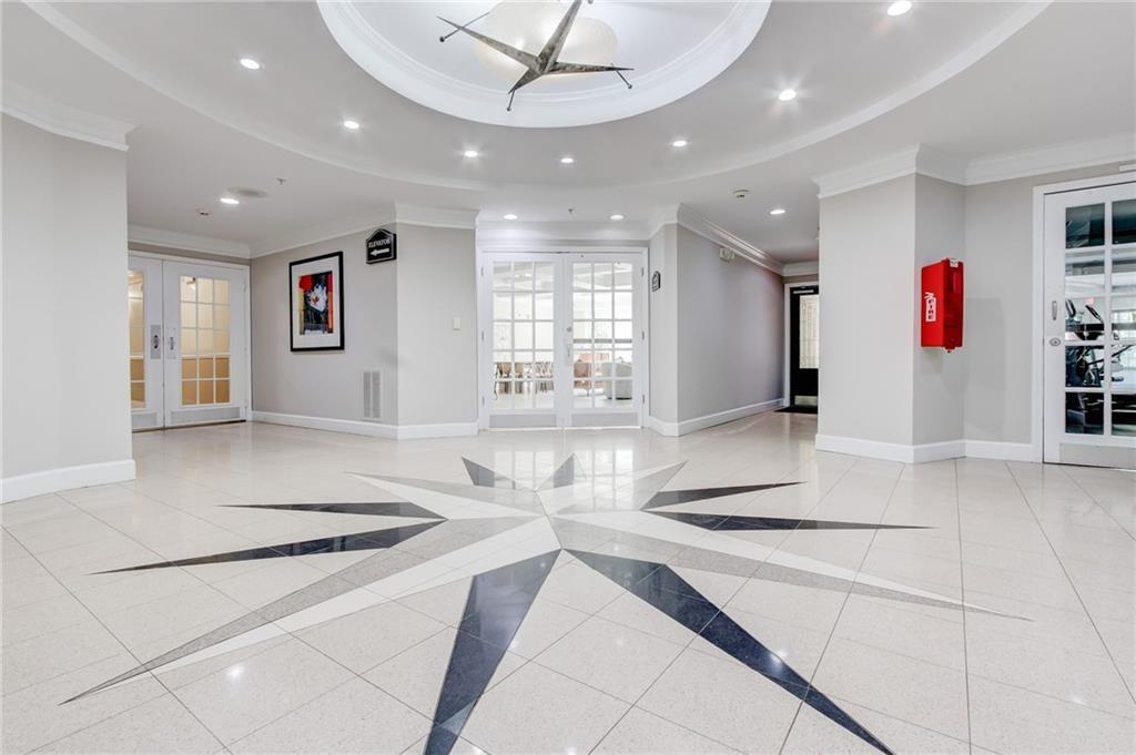 4102 Westchester Ridge Northeast Atlanta, GA 30329 - Photo 23 of 39 a view of counter top space with stainless steel appliances cabinets and outdoor kitchen view