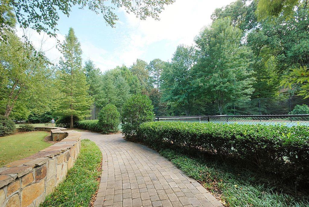 4102 Westchester Ridge Northeast Atlanta, GA 30329 - Photo 33 of 39 a view of a swimming pool and a yard
