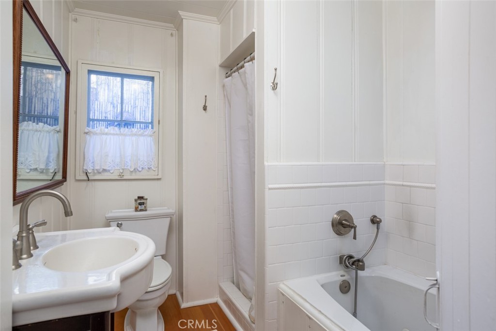 856 Cliff Drive Laguna Beach, CA 92651 - Photo 15 of 28 a bathroom with a sink and a bathtub