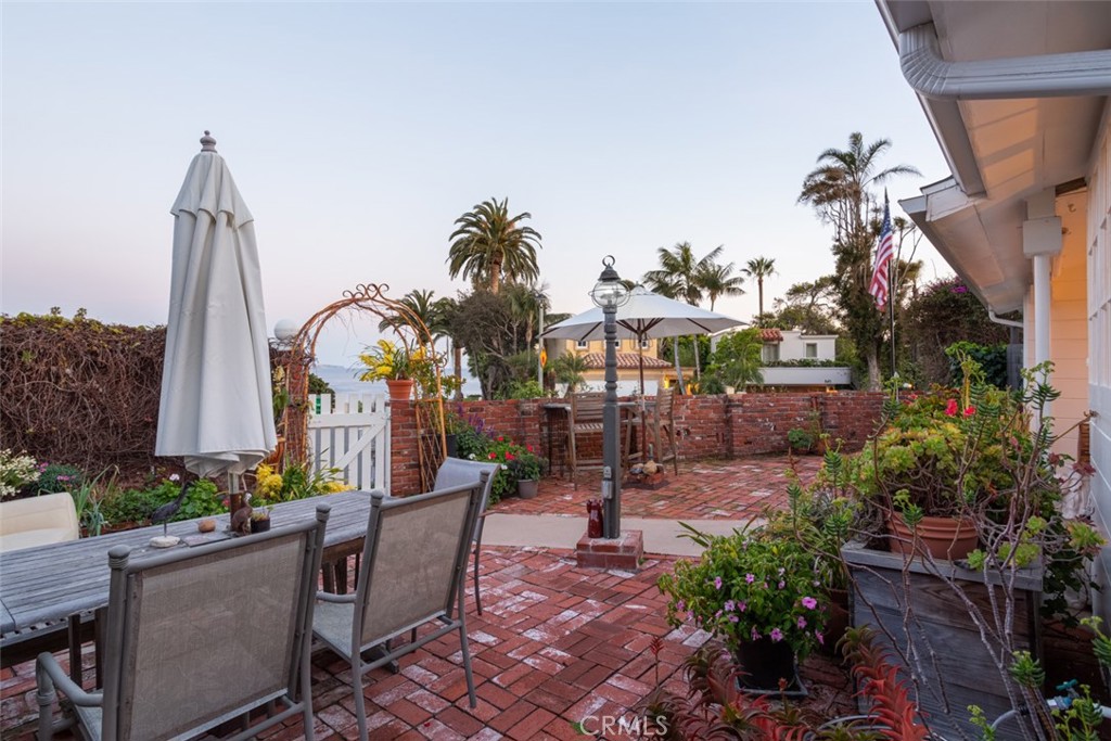 856 Cliff Drive Laguna Beach, CA 92651 - Photo 4 of 28 a view of a house with a patio