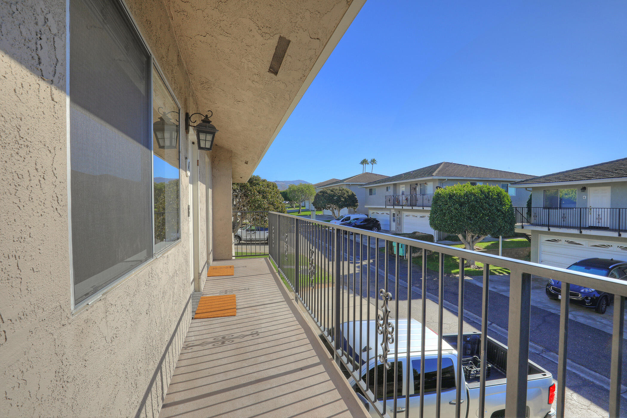 5945 Hickory Street, Unit 4 Carpinteria, CA 93013 - Photo 14 of 19 a view of a balcony with wooden floor