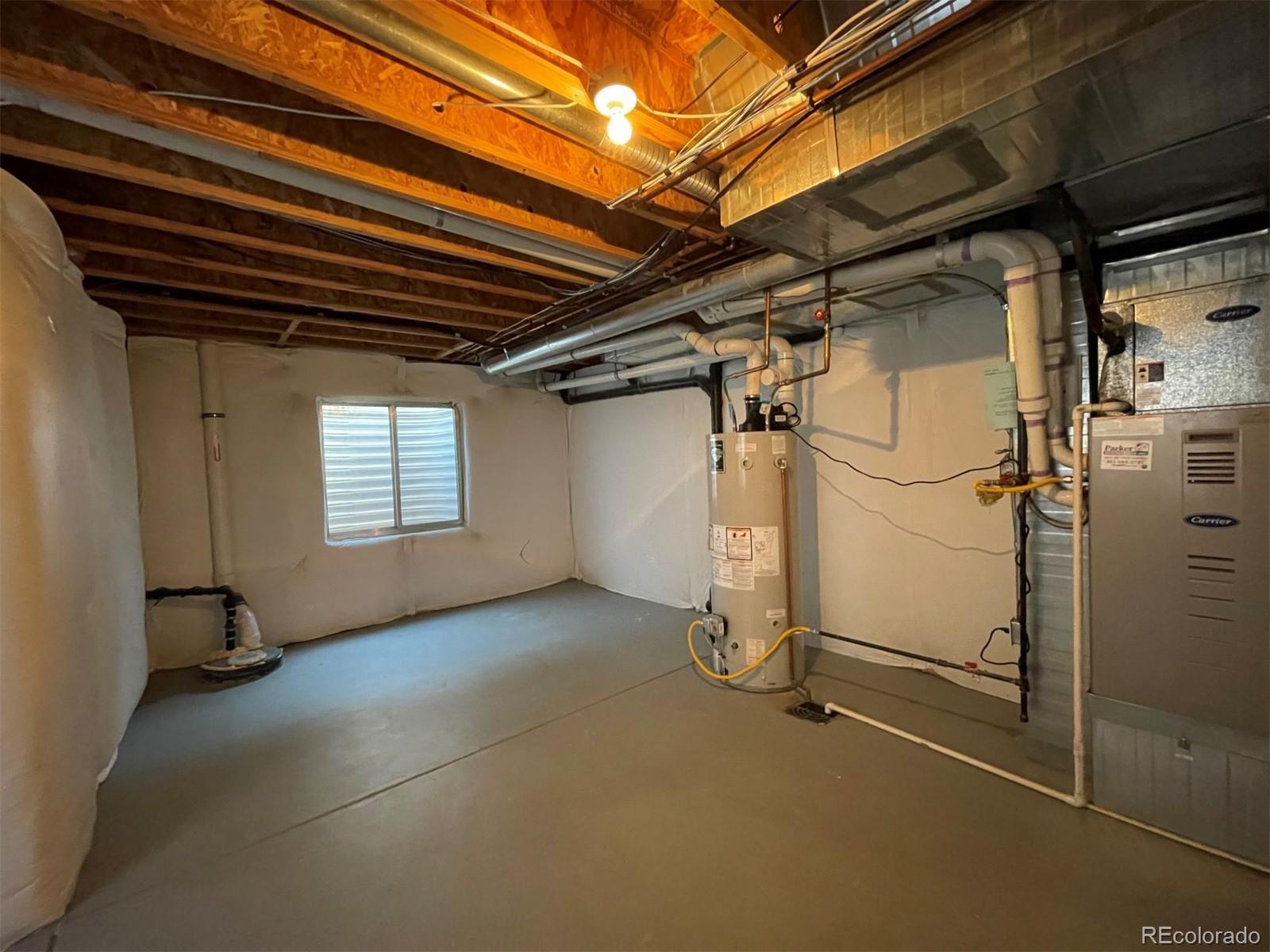 10838 Towerbridge Road Highlands Ranch, CO 80130 - Photo 21 of 26 a view of a room with gym equipment