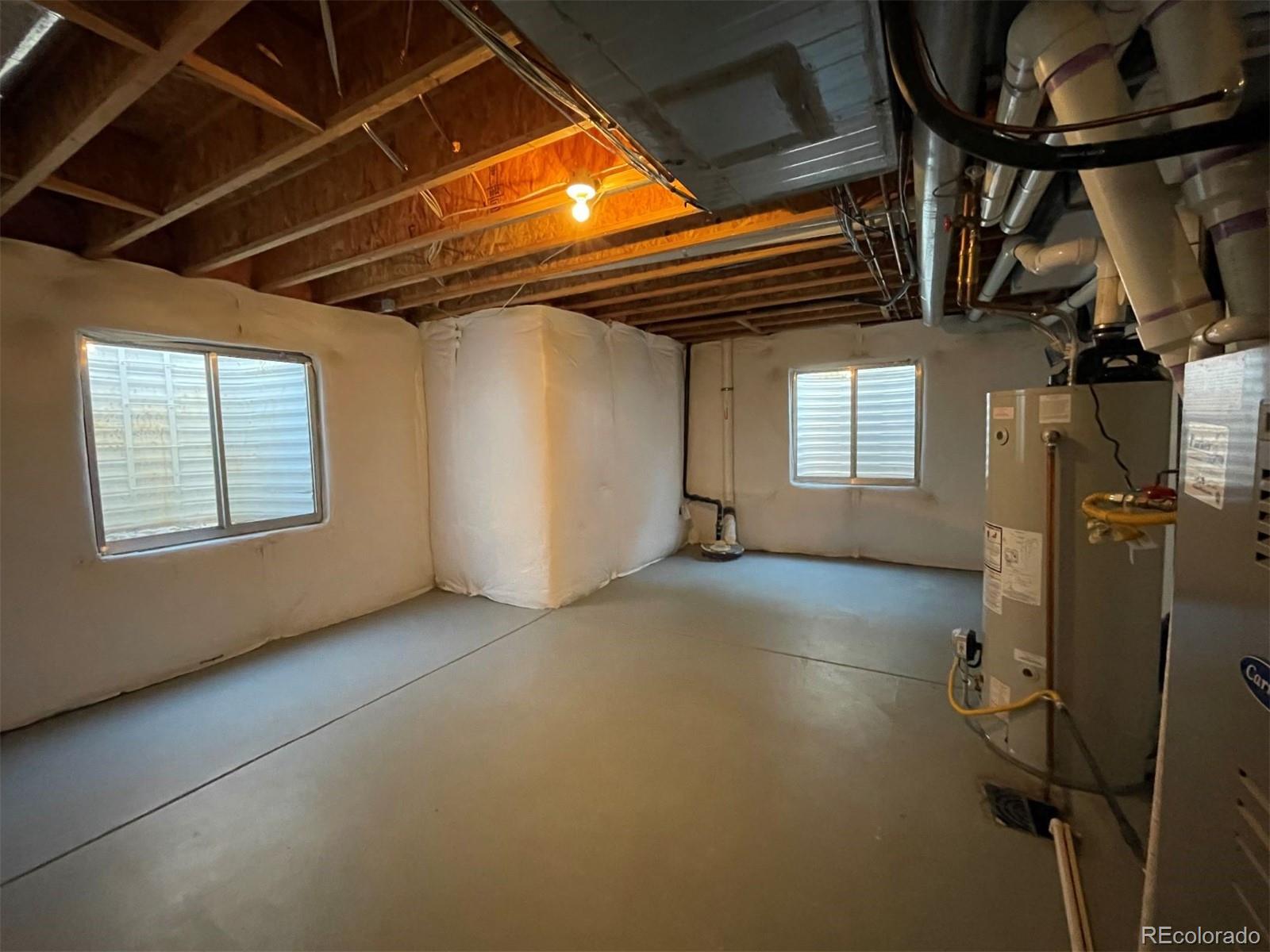 10838 Towerbridge Road Highlands Ranch, CO 80130 - Photo 22 of 26 a view of a room with windows