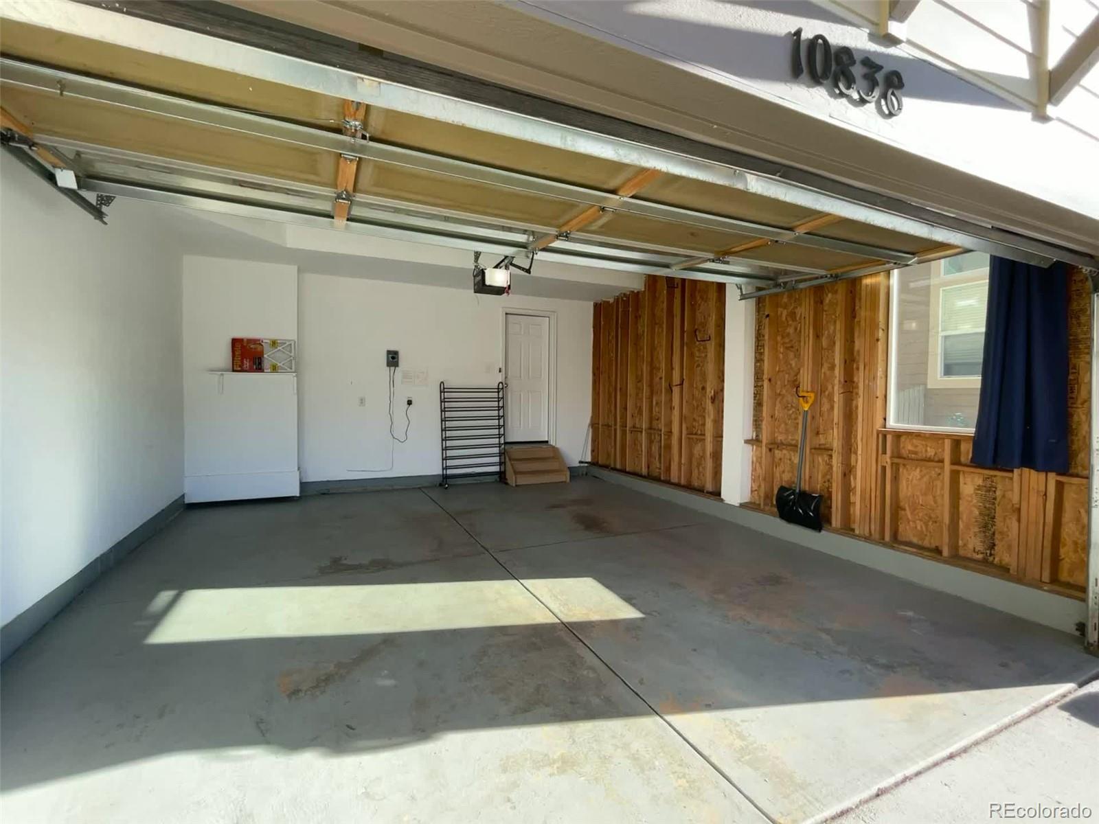10838 Towerbridge Road Highlands Ranch, CO 80130 - Photo 25 of 26 a view of a garage