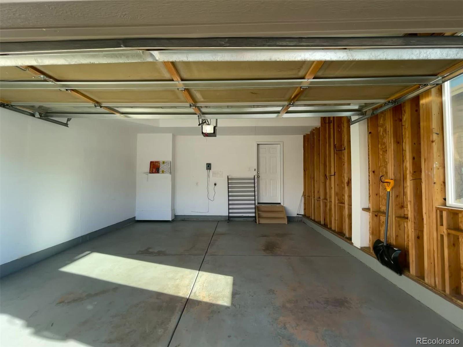 10838 Towerbridge Road Highlands Ranch, CO 80130 - Photo 26 of 26 a view of a garage