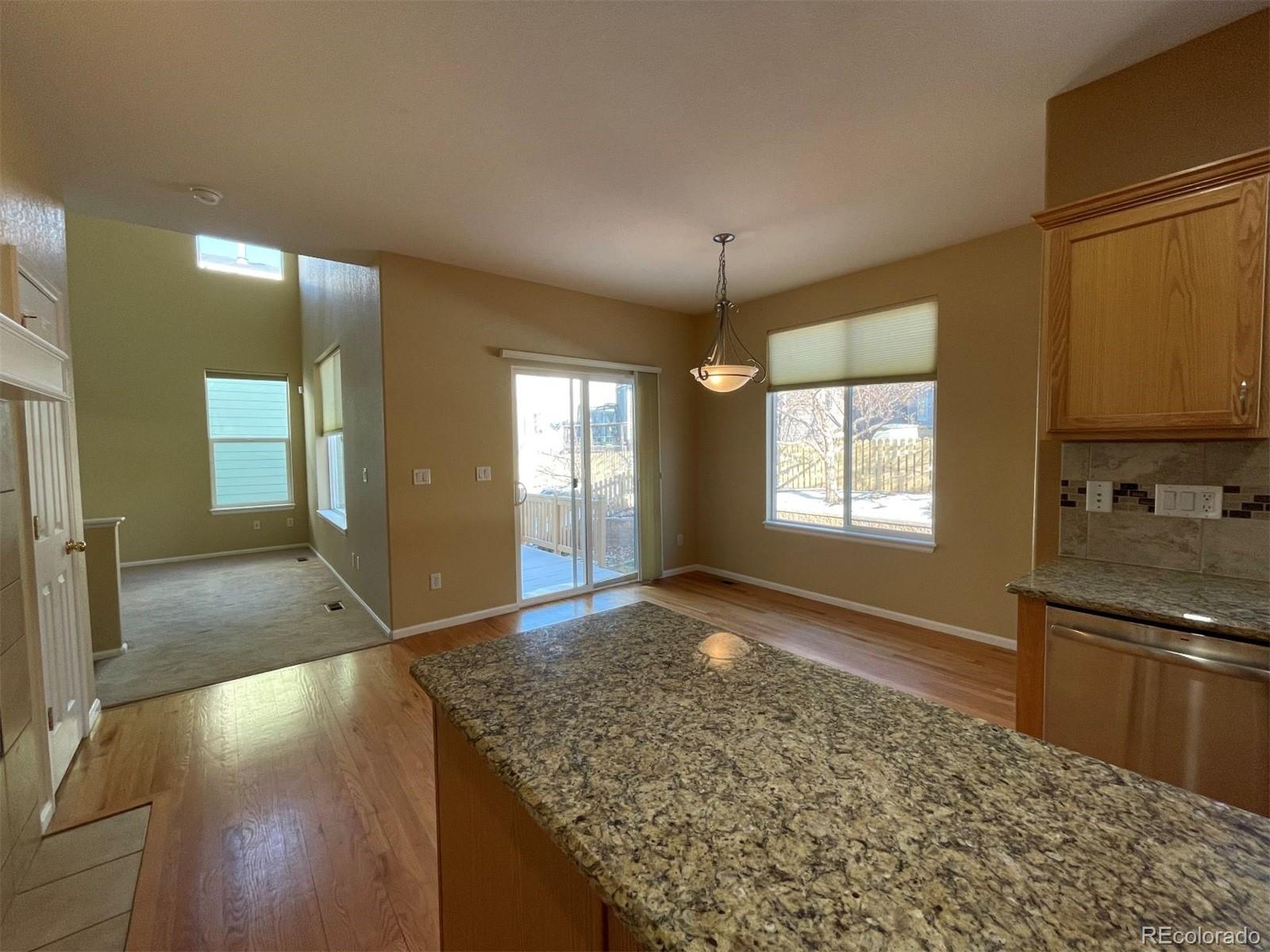 10838 Towerbridge Road Highlands Ranch, CO 80130 - Photo 5 of 26 a view of an empty room and window