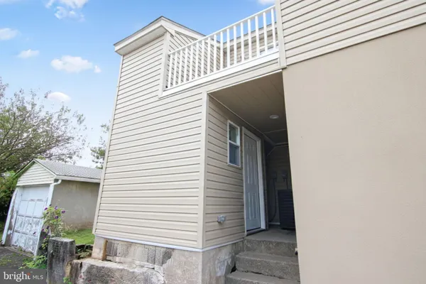 a view of a house with a white door