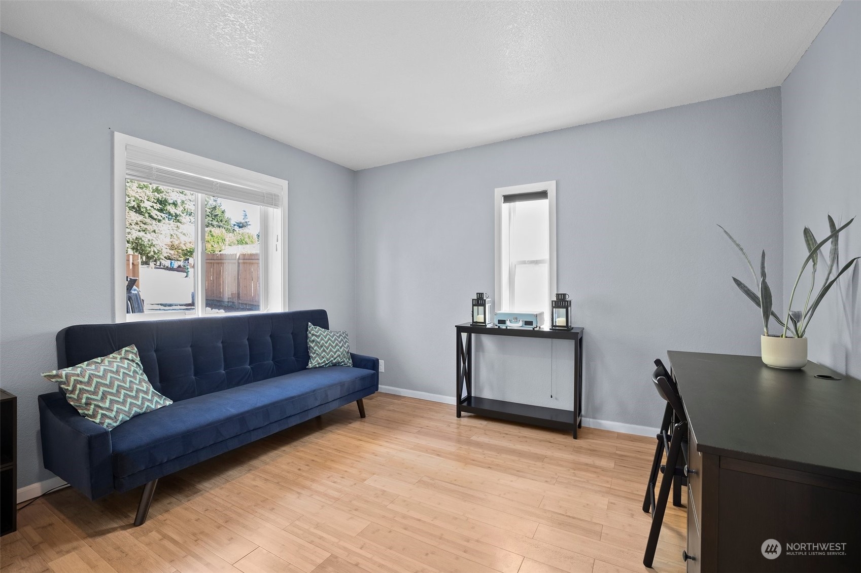 7222 16th Avenue Southwest Seattle, WA 98106 - Photo 21 of 31 a living room with a couch and a window