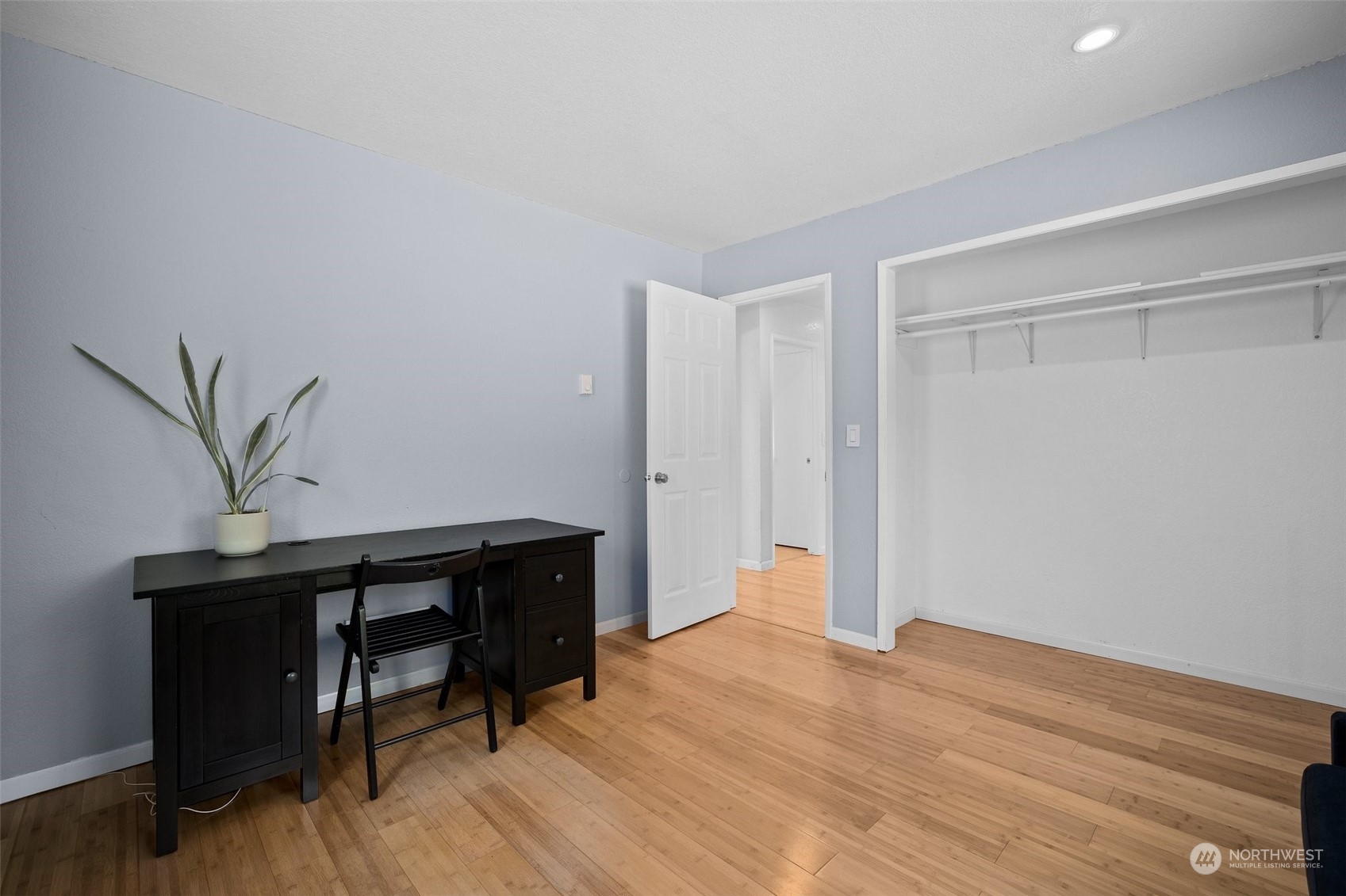 7222 16th Avenue Southwest Seattle, WA 98106 - Photo 23 of 31 a view of a workspace with wooden floor