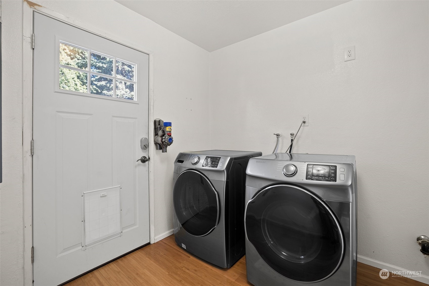 7222 16th Avenue Southwest Seattle, WA 98106 - Photo 25 of 31 a view of a storage & utility room with washer and dryer