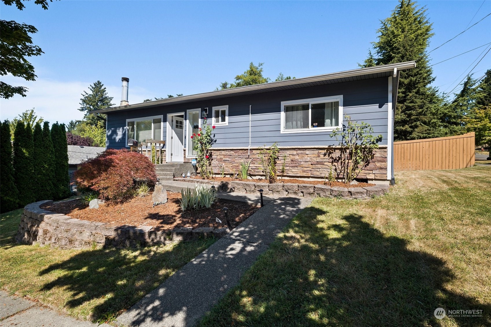 7222 16th Avenue Southwest Seattle, WA 98106 - Photo 26 of 31 a view of a house with a yard