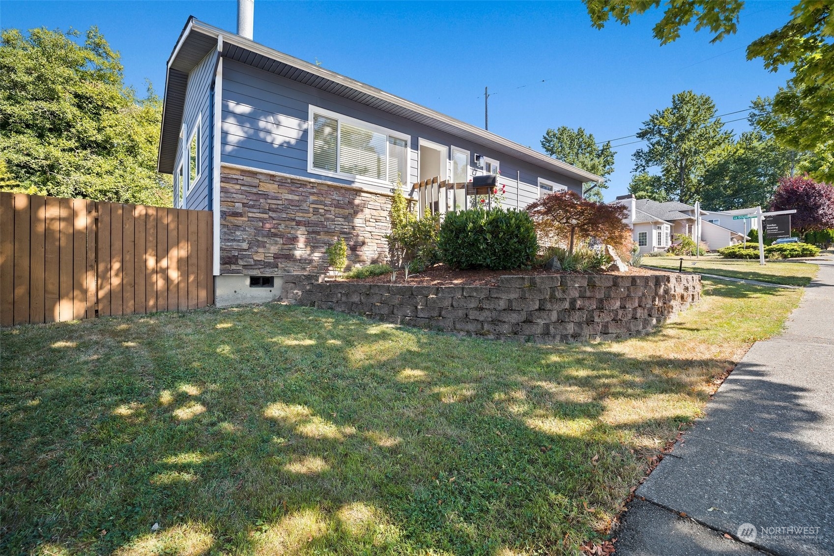 7222 16th Avenue Southwest Seattle, WA 98106 - Photo 27 of 31 a view of a house with backyard and sitting area