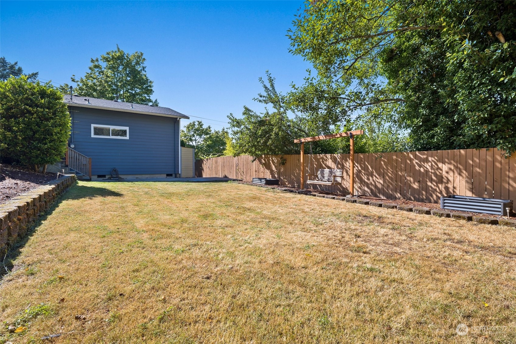7222 16th Avenue Southwest Seattle, WA 98106 - Photo 31 of 31 a view of a yard with a tree