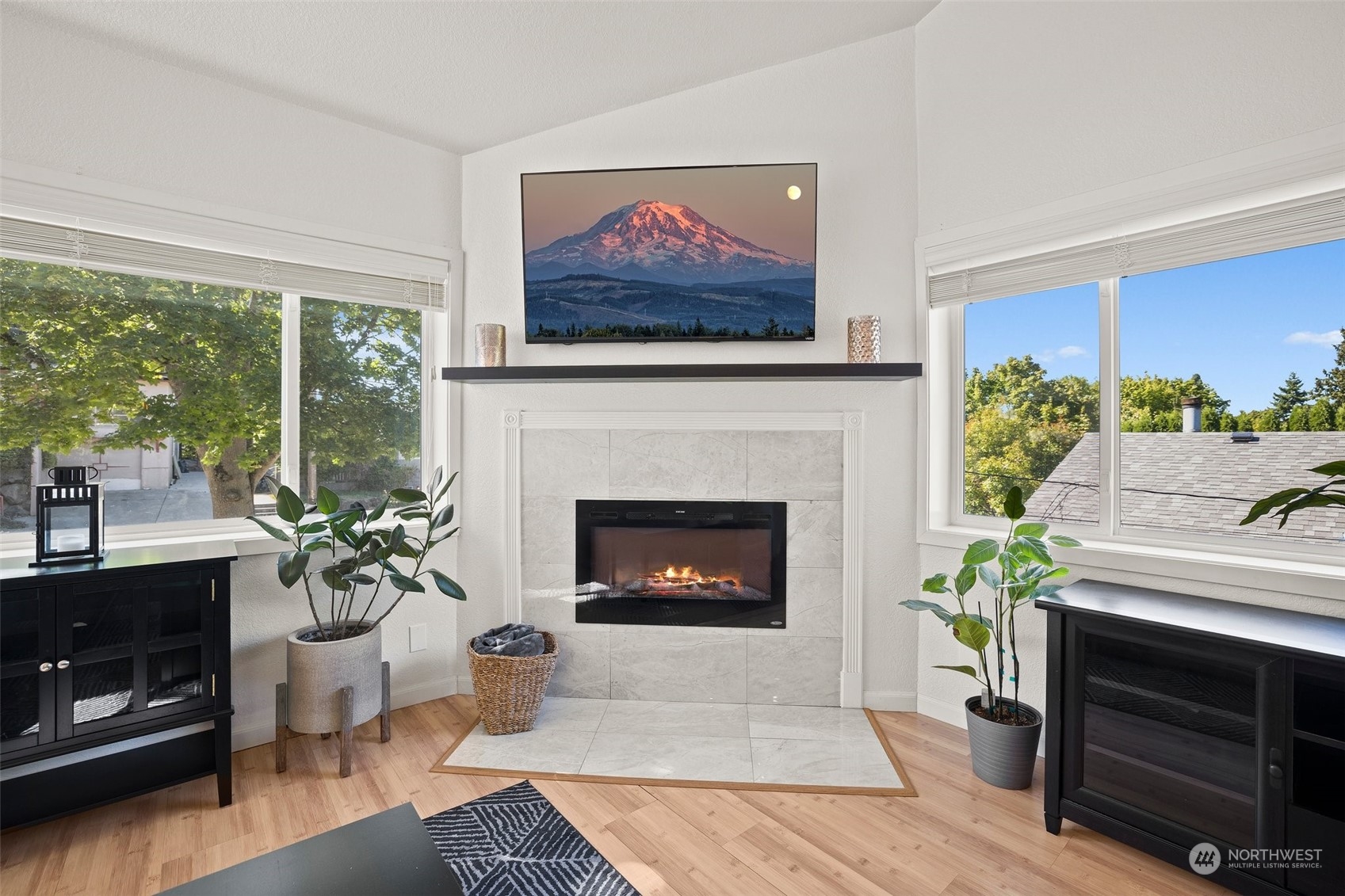 7222 16th Avenue Southwest Seattle, WA 98106 - Photo 5 of 31 a living room with furniture and a fireplace