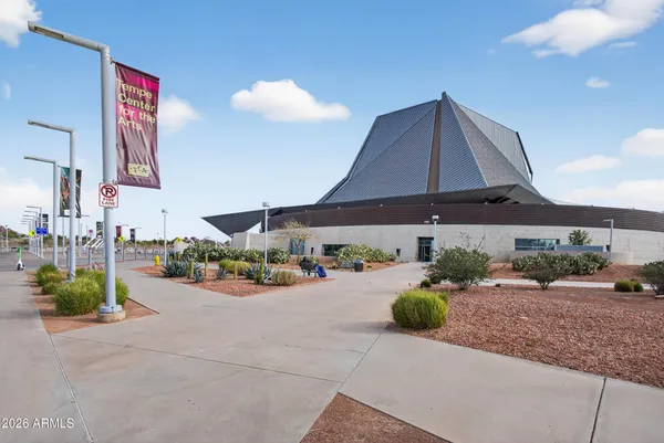 a view of a street with sitting area