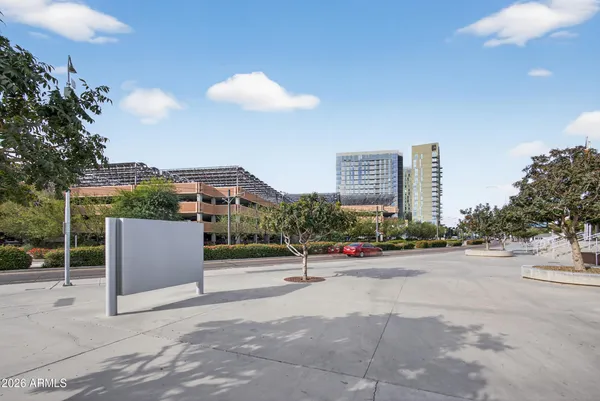 a stove top oven sitting inside of a kitchen