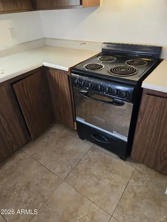a utility room with cabinets
