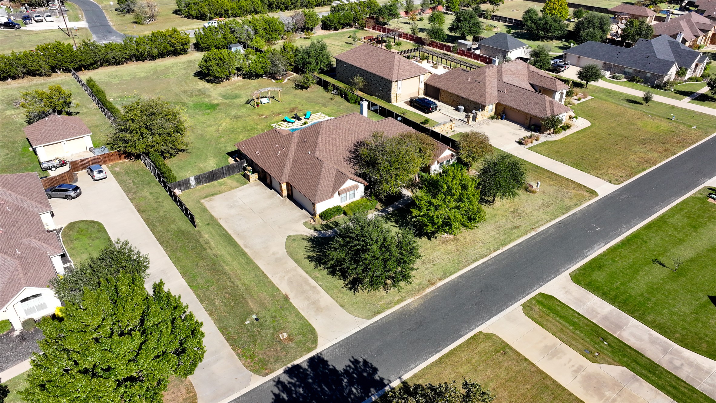 Undisclosed Address Georgetown, TX 78633 - Photo 34 of 39 an aerial view of residential houses with outdoor space