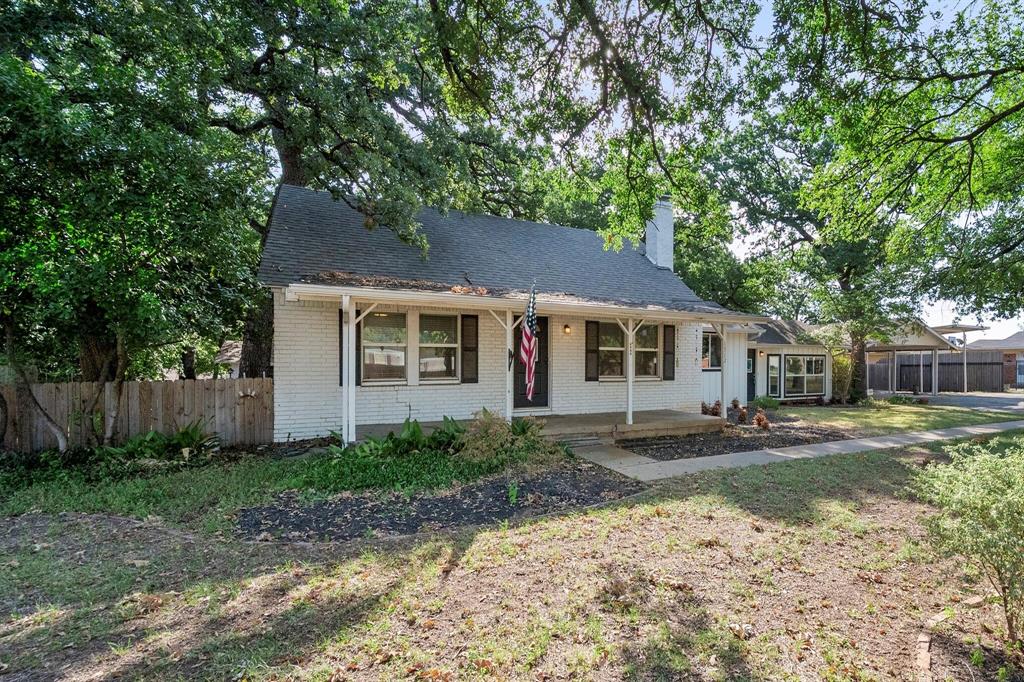 1512 Cardinal Road Mansfield, TX 76063 - Photo 2 of 37 a house with trees in the background