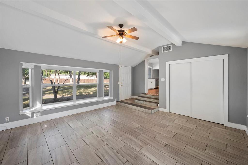 1512 Cardinal Road Mansfield, TX 76063 - Photo 26 of 37 a view of an empty room with a window and wooden floor