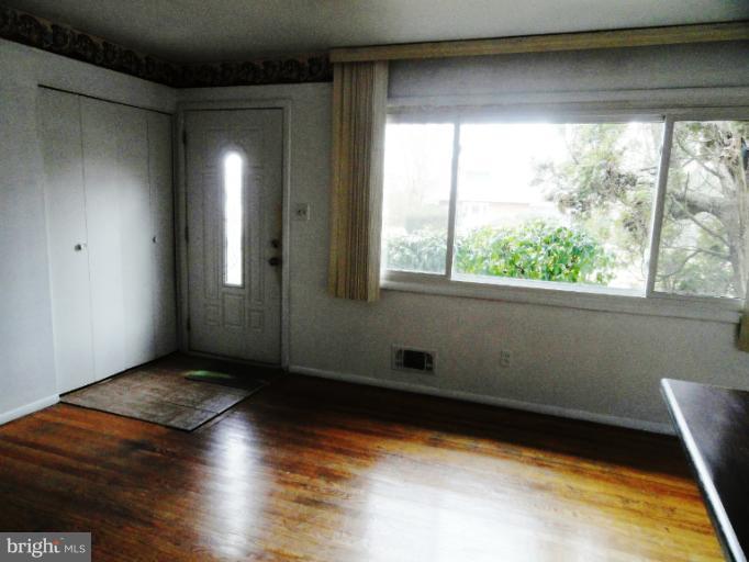 3620 Rusty Rock Road Randallstown, MD 21133 - Photo 7 of 16 Front door, Closet & Picture Window in Living Room
