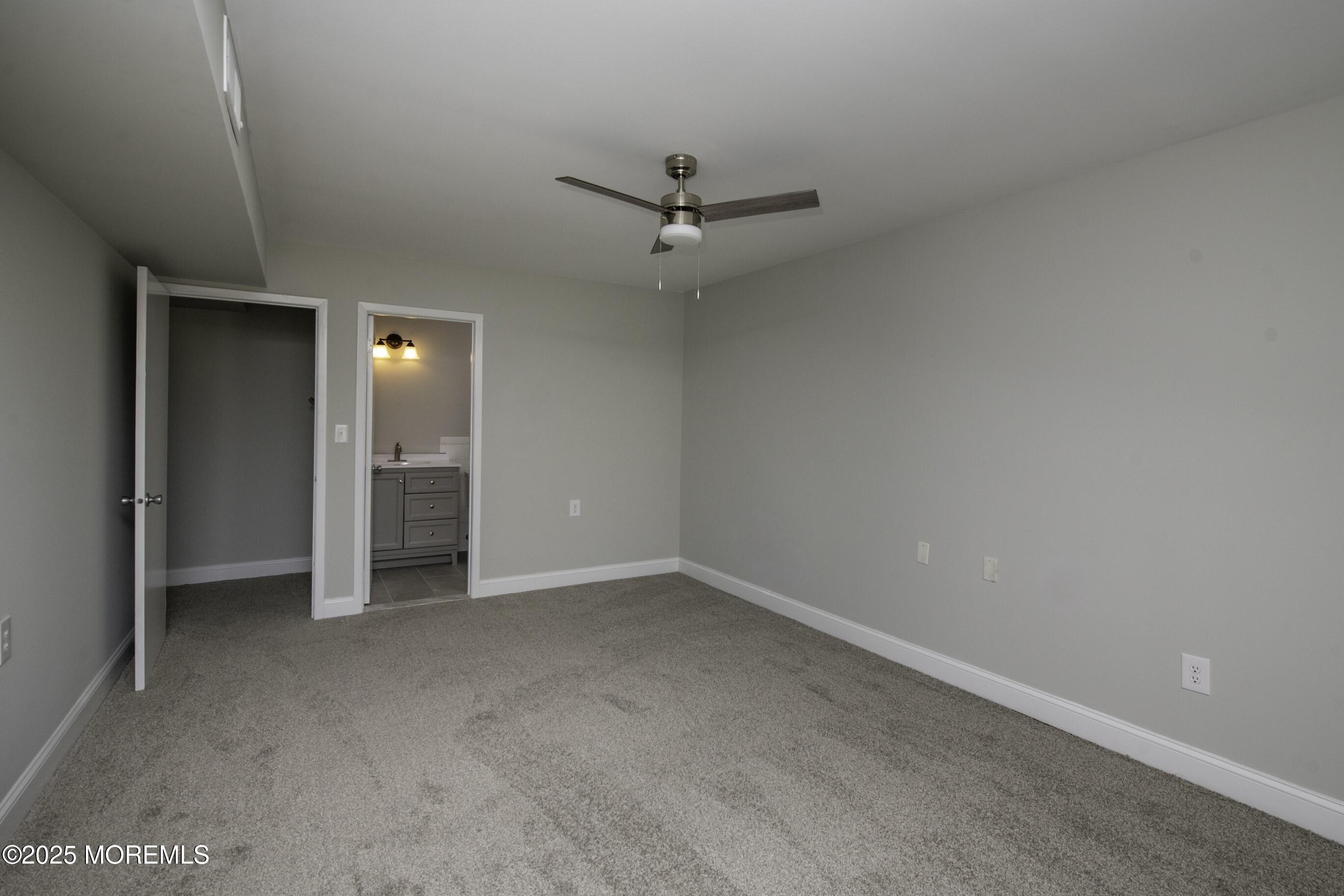 5 B Auburn Court Red Bank, NJ 07701 - Photo 12 of 19 an empty room with closet and windows