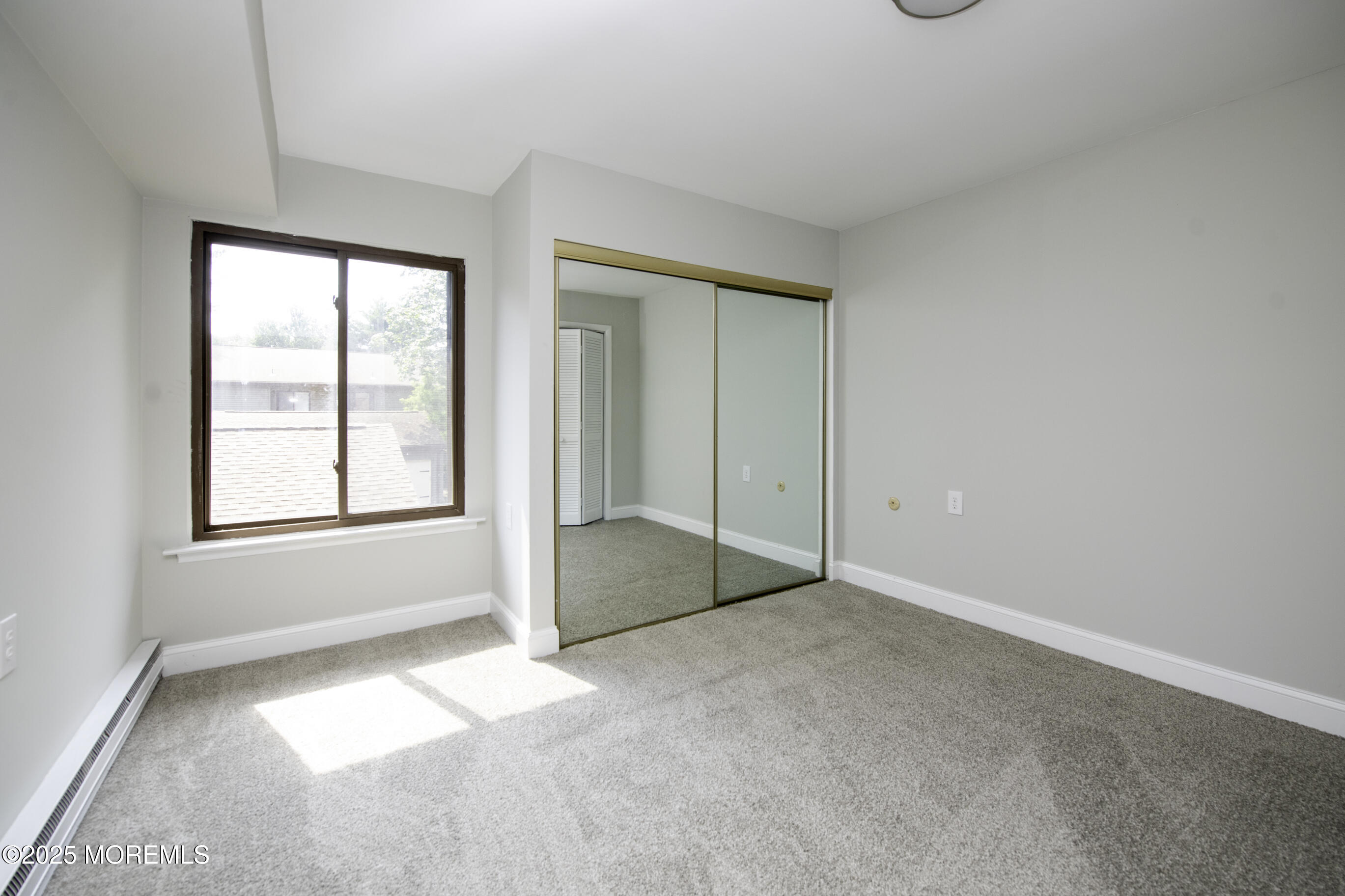 5 B Auburn Court Red Bank, NJ 07701 - Photo 14 of 19 an empty room with windows