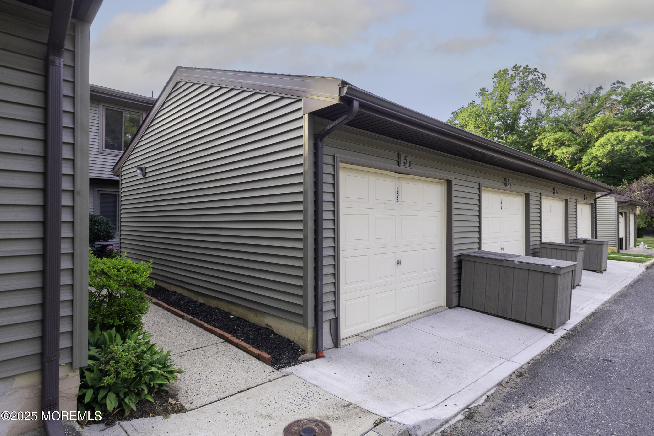 5 B Auburn Court Red Bank, NJ 07701 - Photo 3 of 19 a front view of a house with plants