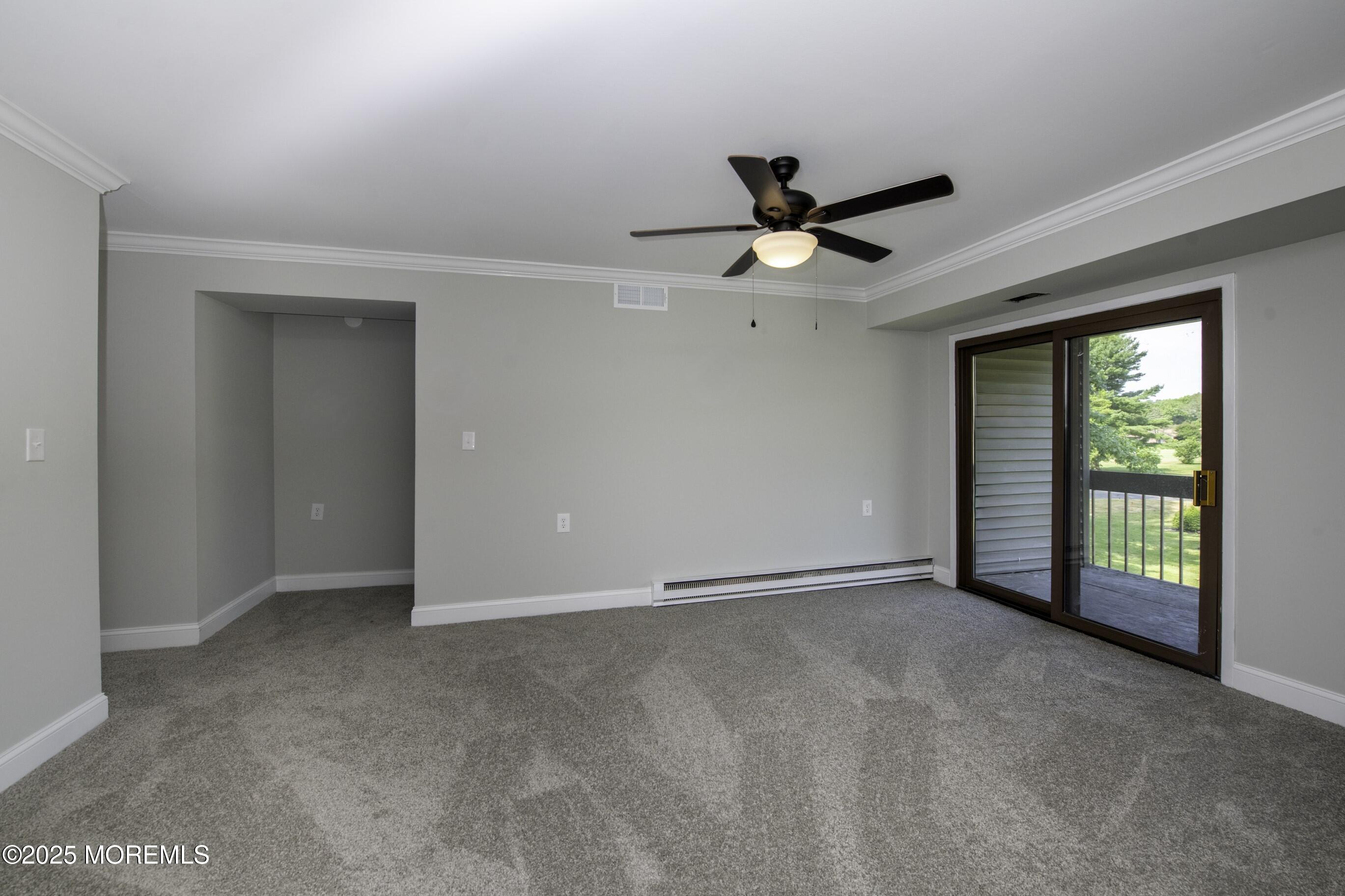 5 B Auburn Court Red Bank, NJ 07701 - Photo 4 of 19 a view of an empty room with a window