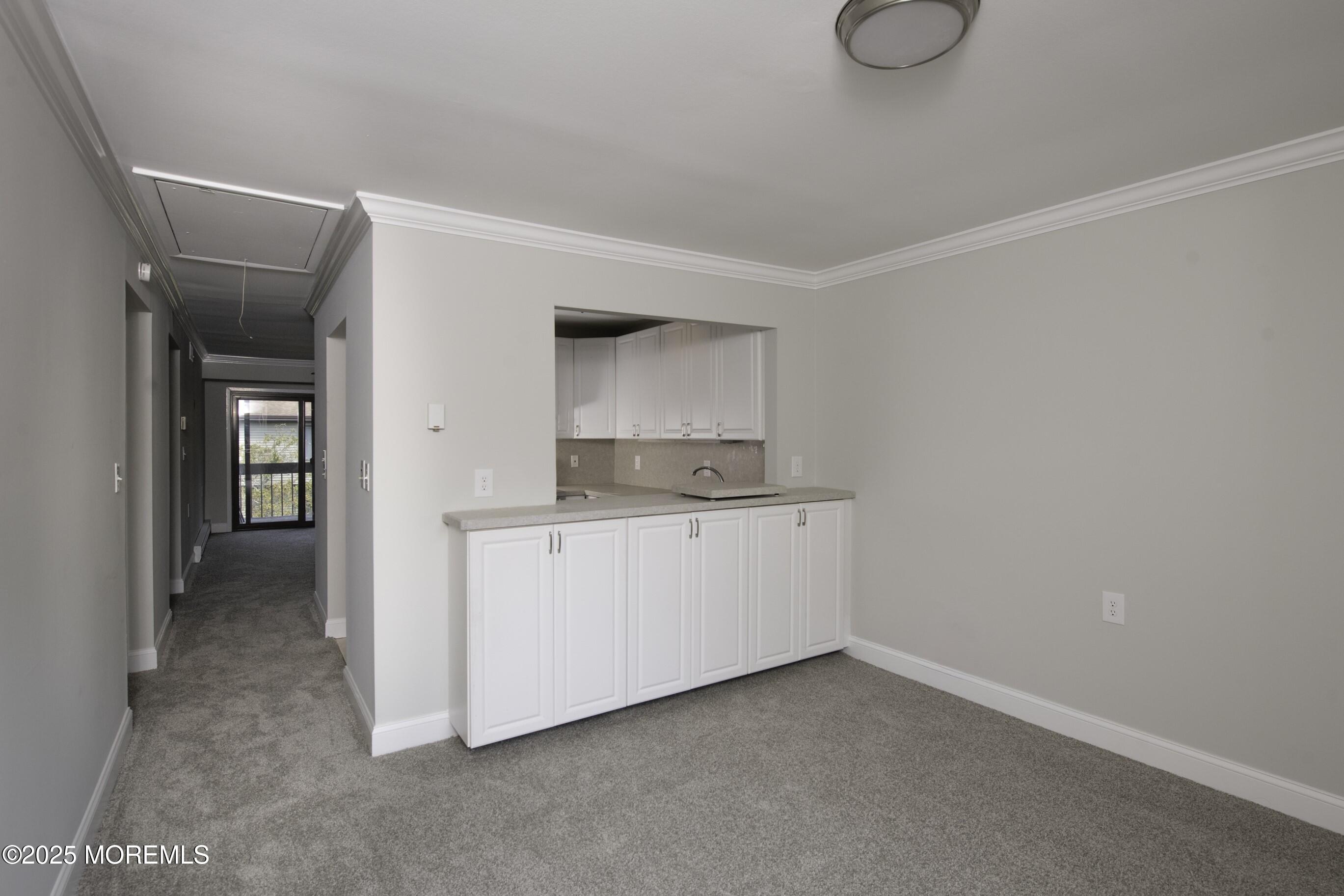5 B Auburn Court Red Bank, NJ 07701 - Photo 7 of 19 a room with a sink and cabinets