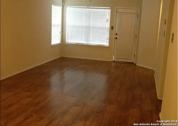 an empty room with a window