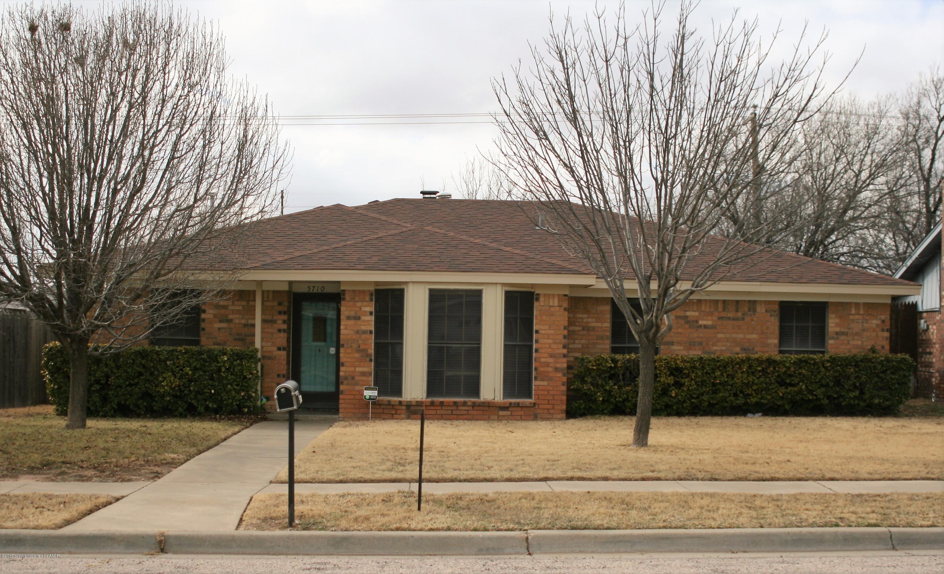5710 South Milam Street Amarillo, TX 79110 - Photo 1 of 21 a view of a house with a tree