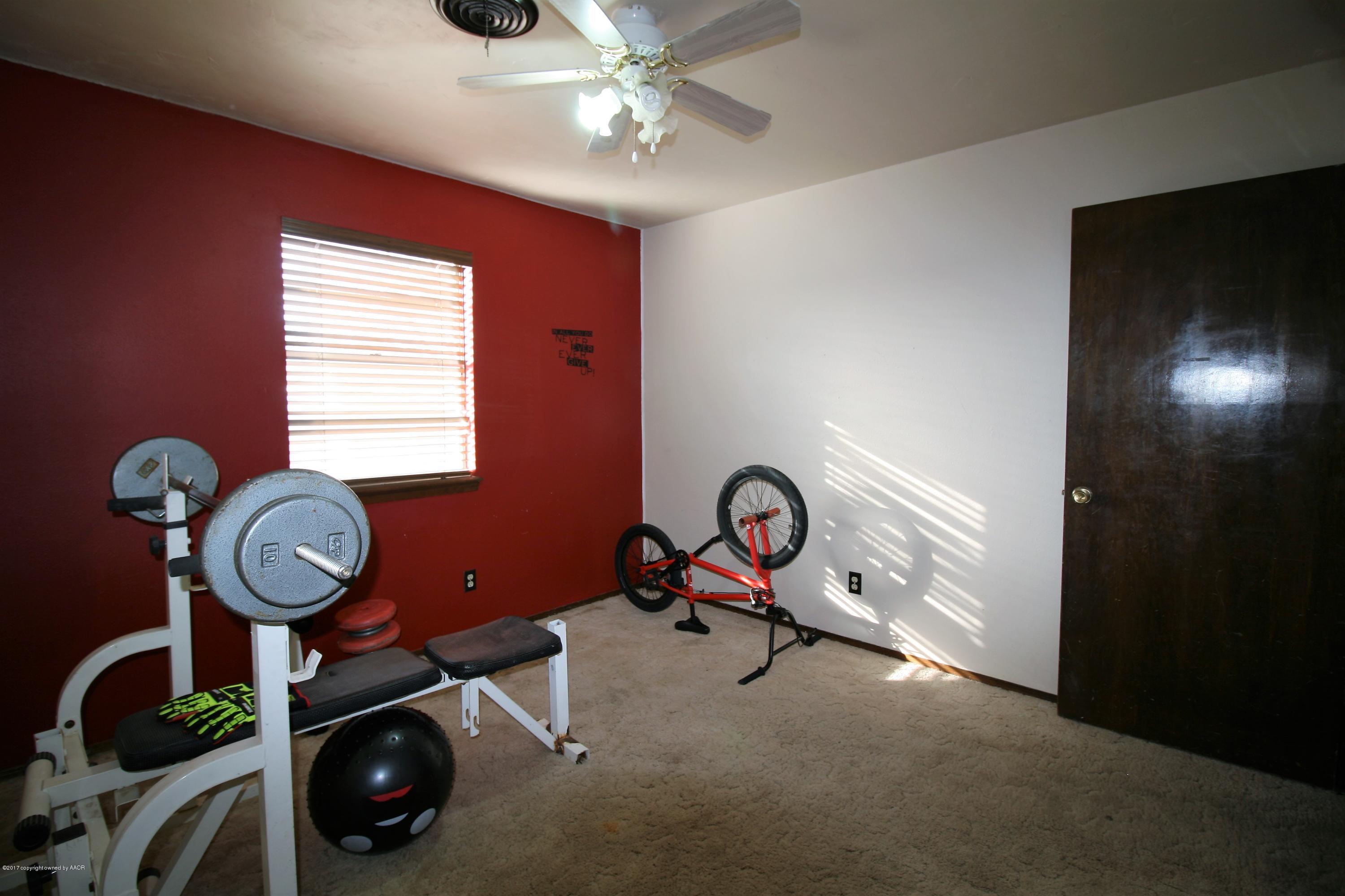5710 South Milam Street Amarillo, TX 79110 - Photo 13 of 21 a view of a room with gym equipment