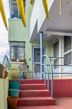 a front view of house with outdoor seating