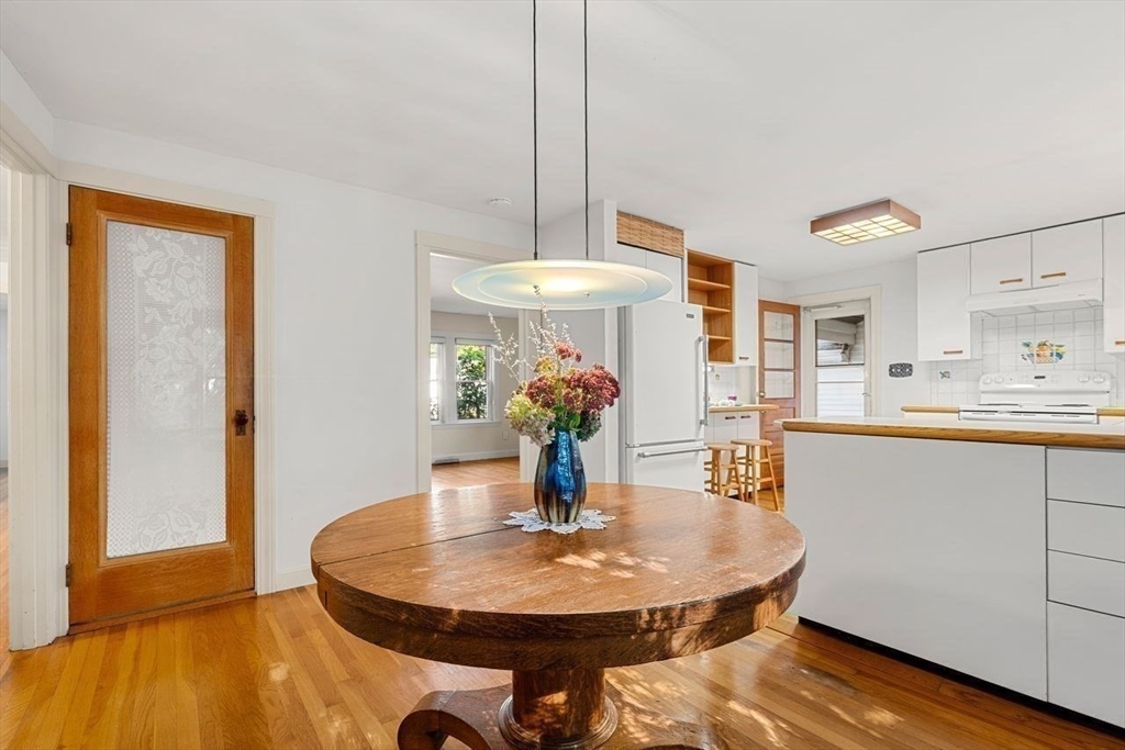 9 Pearson Street Beverly, MA 01915 - Photo 12 of 41 a dining room with furniture and wooden floor
