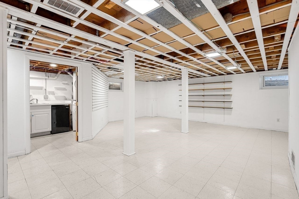 9 Pearson Street Beverly, MA 01915 - Photo 23 of 41 a view of an empty room with a windows