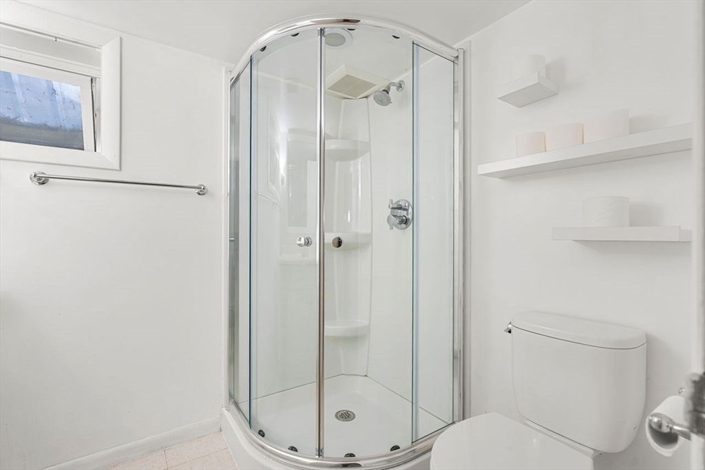 9 Pearson Street Beverly, MA 01915 - Photo 26 of 41 a bathroom with a shower and a toilet