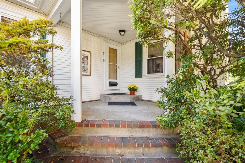 9 Pearson Street Beverly, MA 01915 - Photo 3 of 41 a front view of a house with trees
