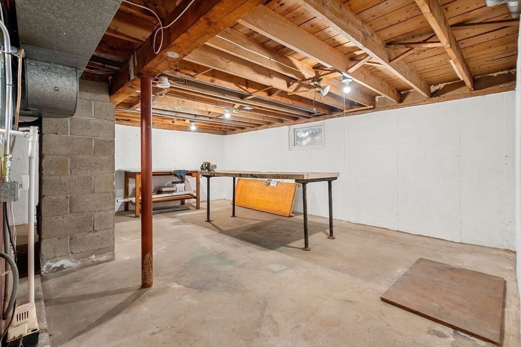 9 Pearson Street Beverly, MA 01915 - Photo 31 of 41 a view of a room with wooden floor