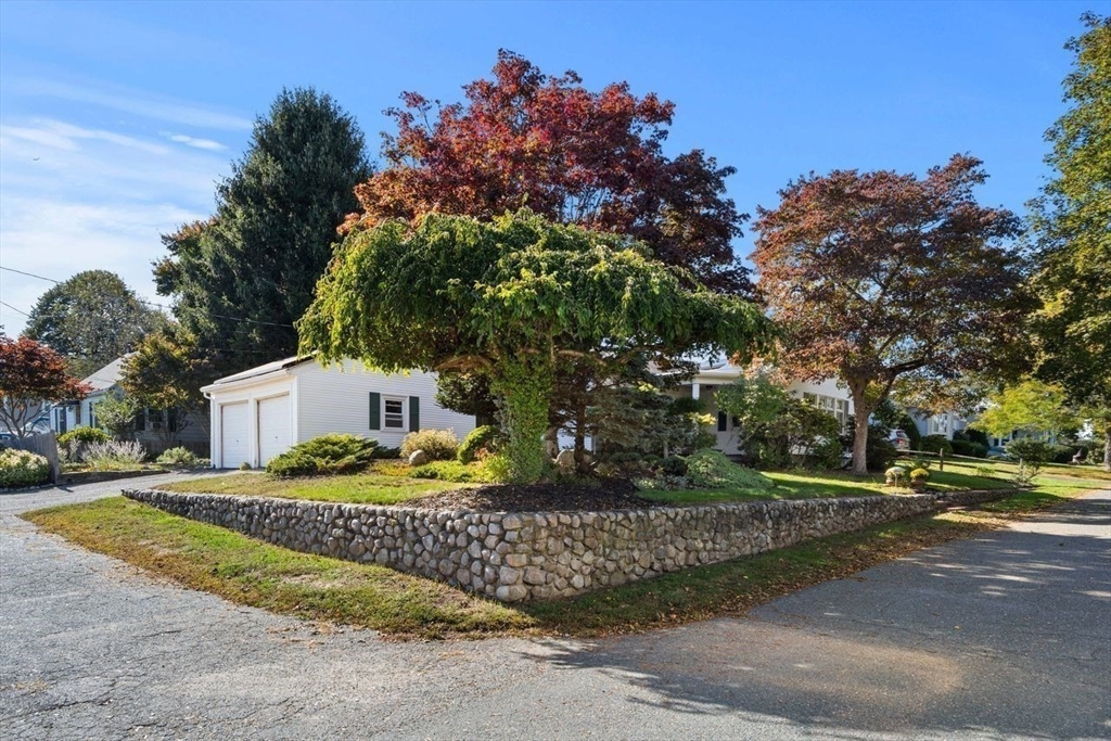 9 Pearson Street Beverly, MA 01915 - Photo 32 of 41 a front view of a house with a yard