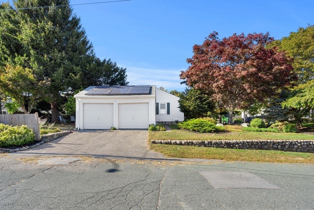 9 Pearson Street Beverly, MA 01915 - Photo 4 of 41 a view of a house with a yard and large tree