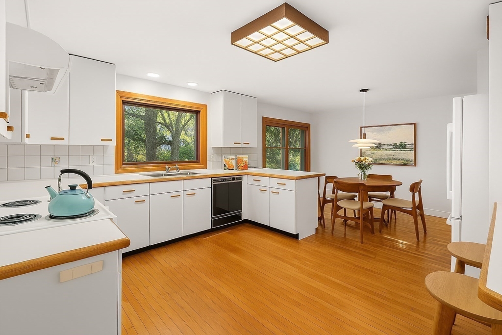 9 Pearson Street Beverly, MA 01915 - Photo 7 of 41 a kitchen with a sink cabinets and window